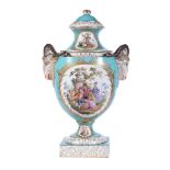 A Dresden pale-blue ground and gilt two-handled porcelain vase and cover