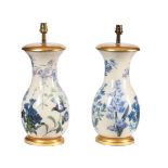 A pair of modern reverse-glass printed botanical baluster lamp bases