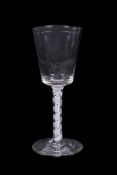 A Dutch stipple engraved opaque-twist wine glass