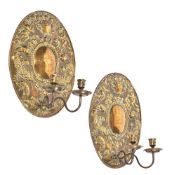 A pair of brass wall sconces