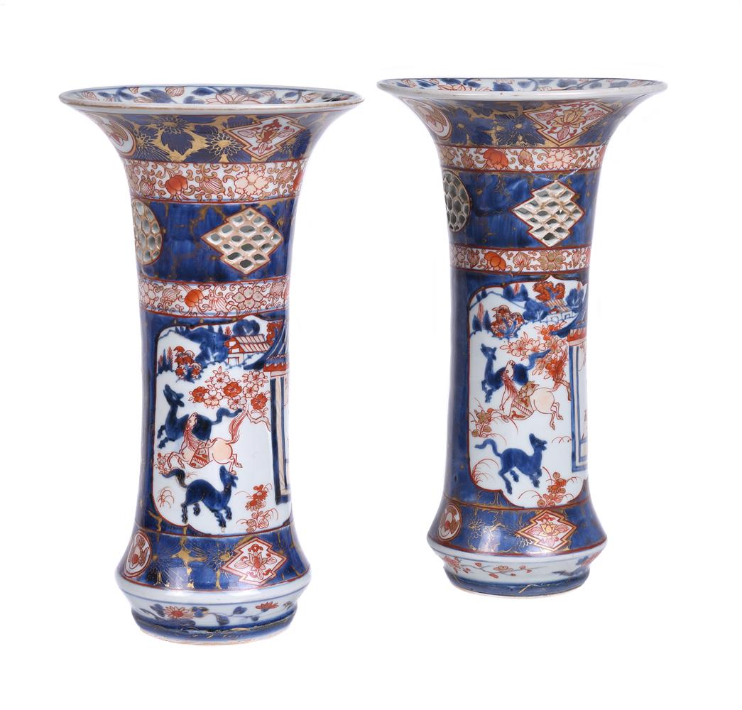 A pair of Imari pierced beaker vases