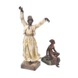 A cold painted bronze figure of a dancing Arab