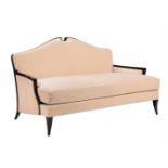 A Christopher Guy sofa in beige upholstery