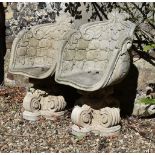 A pair of stone composite cast garden tub chairs