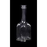 An English cruciform clear-glass decanter or serving bottle