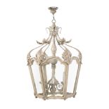 A distressed white painted hall lantern chandelier