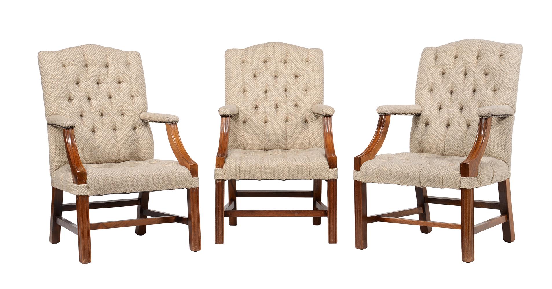 A set of three mahogany and upholstered armchairs in George III style