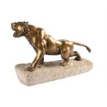 A bronze model of a tiger on a stone base