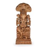 A monumental carved wood figure of Ganesha