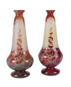 A pair of Continental orange overlay glass vases