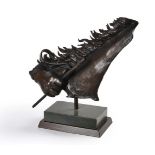 A bronze fragment of a racehorse