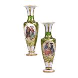 A pair of Bohemian green glass and white overlay vases