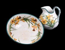 A Wemyss (Robert Heron & Sons) Pottery ewer and basin painted with daffodils