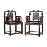 A pair of Chinese carved hardwood and mother of pearl armchairs