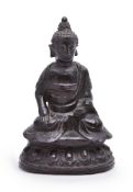 A Chinese bronze model of Buddha