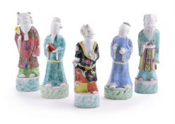 A group of five Chinese famille rose standing immortals