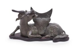 A Chinese bronze 'xiniu' mirror holder