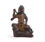 A Chinese gilt and red lacquer bronze figure of Guandi