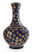 A Chinese gilt-decorated blue-ground bottle vase