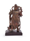 A large Chinese bronze heavily cast Guardian figure