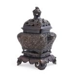 A Chinese bronze rectangular shaped two-handled censer and cover and openwork stand