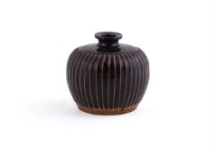 A Chinese Cizhou-type black glazed ribbed vase