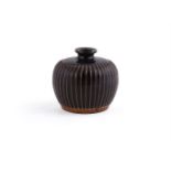 A Chinese Cizhou-type black glazed ribbed vase