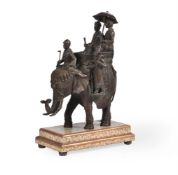 An Indian bronze model of an elephant with riders and open howdah