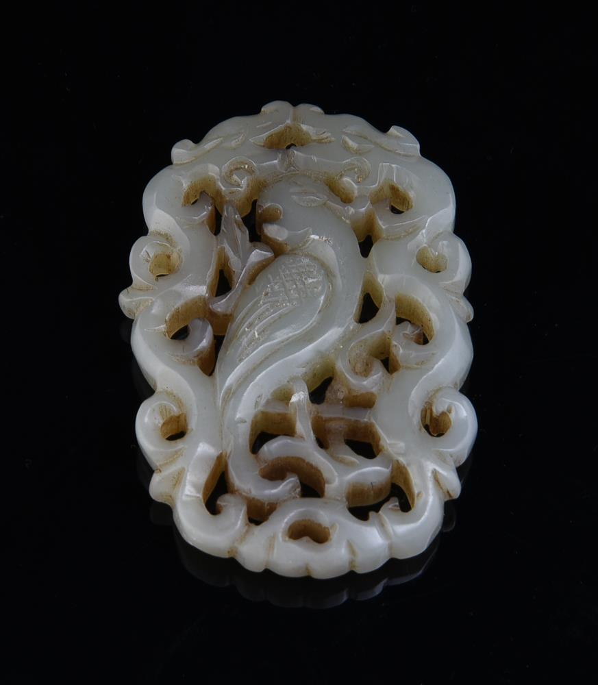 A white jade belt hook and ten other jade carvings and pendants - Image 12 of 19