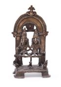 A tribal bronze shrine depicting Siva and Parvati
