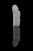 A small Chinese white jade figure of a boy
