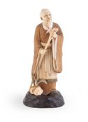 Y A Japanese Carved Ivory Figure of a Chinese sage
