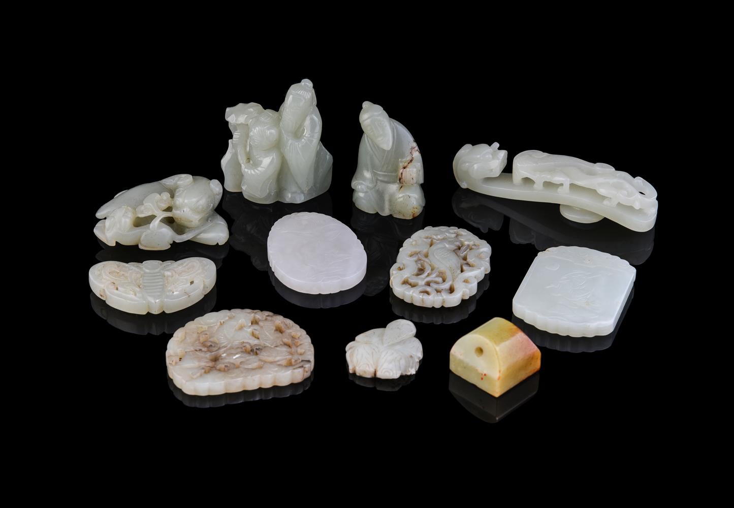 A white jade belt hook and ten other jade carvings and pendants