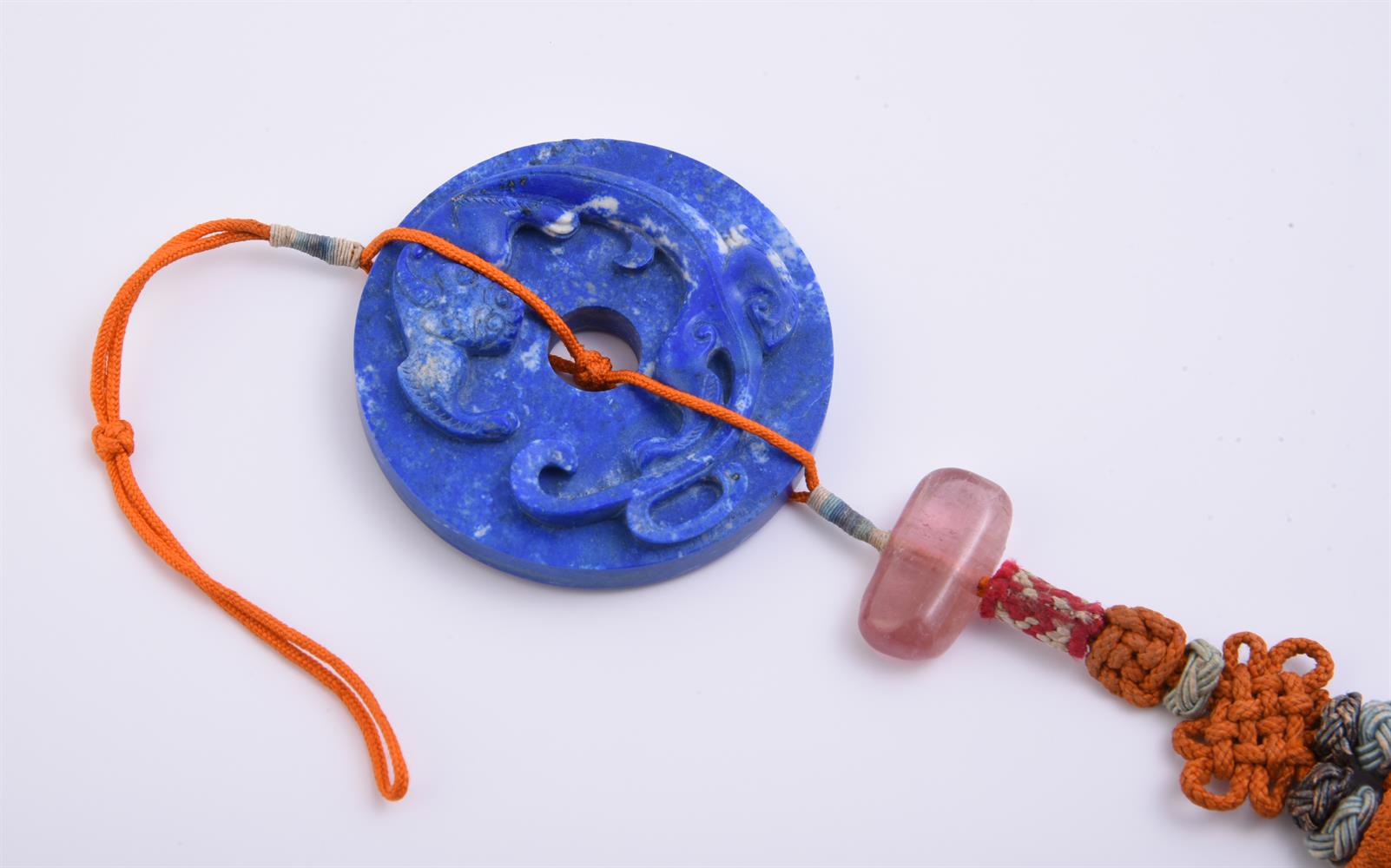 A Chinese carved lapis lazuli disc pendent - Image 2 of 3