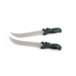 A pair of jadeite models of daggers