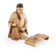 Y A Japanese Ivory Figure of a Scholar