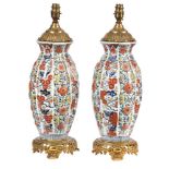 A pair of modern Chinese polychrome porcelain table lamps