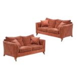 A pair of walnut and red and gold striped sofas