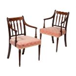 A pair of George III mahogany armchairs