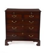 A George III mahogany and pine bachelor's chest of drawers