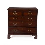 A George III mahogany and pine bachelor's chest of drawers