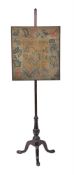 A George III mahogany pole-screen