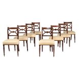 A set of eight Regency mahogany and brass inlaid dining chairs
