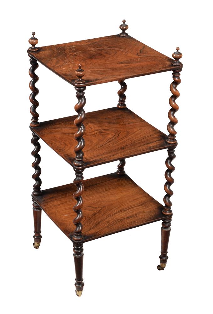 Y An early Victorian rosewood three tier whatnot