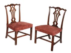 A pair of George III mahogany and upholstered side chairs