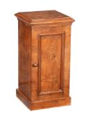 A Victorian figured walnut pedestal cupboard