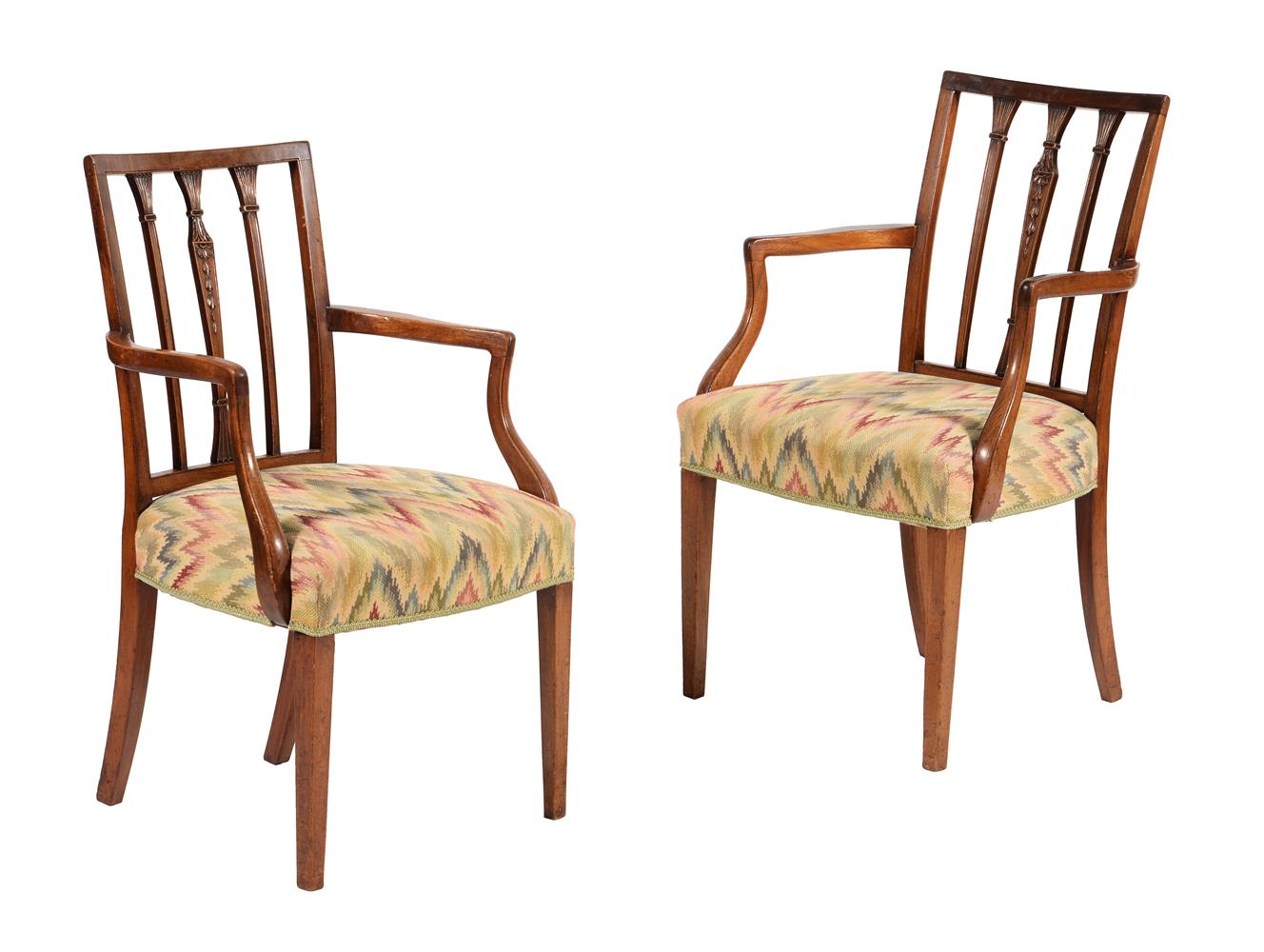 A pair of George III mahogany armchairs