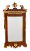 A Mahogany and giltwood wall mirror in George II style