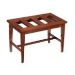 A mahogany luggage rack