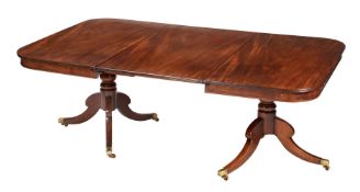 A Regency mahogany dining table